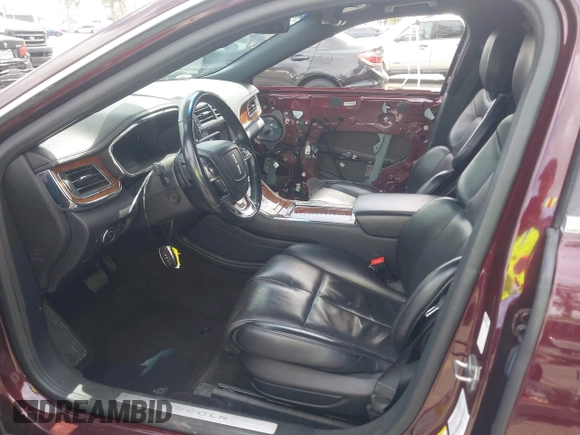 2019 Lincoln Continental Select z VIN 1LN6L9SK5K5600535, wystawiony jako IAAI lot #41877965 z przebiegiem 120 567 mil mil oraz . Historia ofert i sprzedaży dostępna na DreamBid. Obrazek 5.
