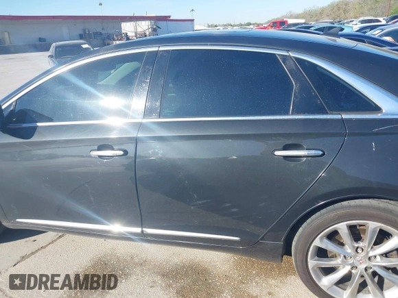 2013 Cadillac XTS Luxury with VIN 2G61R5S38D9110582, listed as a IAAI auction lot 41859720 with 92,744 mi miles. Bid and sale history available at carsss.com. Image 14.