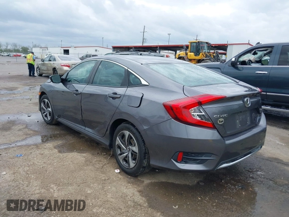 2019 Honda Civic LX with VIN 19XFC2F68KE007409, listed as a IAAI auction lot 41887406 with 57,147 mi miles and . Bid and sale history available at DreamBid. Image 3.