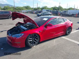 2022 Tesla Model S Plaid with VIN 5YJSA1E61NF460253, listed as a IAAI auction lot 40328727 with Not provided miles and . Bid and sale history available at DreamBid. Image 2.