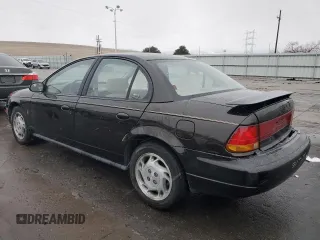 1996 Saturn SL с VIN 1G8ZK5276TZ240883, выставлен на аукционе Copart как лот 84172554 с пробегом 69 820 миль миль и Списание • Salvage title. История ставок и продаж доступна на DreamBid. Изображение 2.