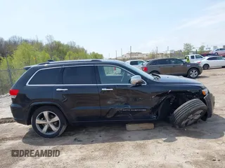 2016 Jeep Grand Cherokee Overland with VIN 1C4RJFCG5GC343752, listed as a IAAI auction lot 42138080 with 86,777 mi miles and . Bid and sale history available at DreamBid. Image 13.