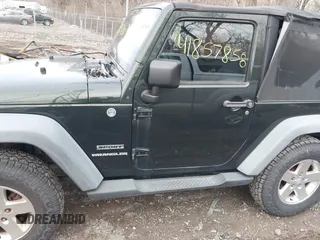 2011 Jeep Wrangler Sport with VIN 1J4AA2D18BL588273, listed as a IAAI auction lot 41857858 with 136,473 mi miles and . Bid and sale history available at carsss.com. Image 14.