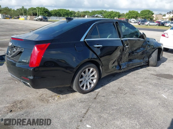 2015 Cadillac CTS RWD with VIN 1G6AP5SX8F0140364, listed as a IAAI auction lot 42535236 with 126,277 mi miles and . Bid and sale history available at DreamBid. Image 4.
