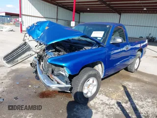 1998 Dodge Dakota SLT with VIN 1B7FL26XXWS716967, listed as a IAAI auction lot 41492594 with 189,176 mi miles and . Bid and sale history available at DreamBid. Image 2.