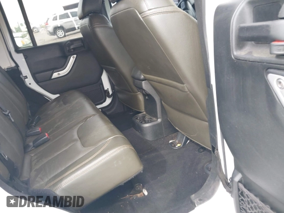 2017 Jeep Wrangler Unlimited Sahara with VIN 1C4BJWEG3HL752719, listed as a IAAI auction lot 41892600 with 127,486 mi miles. Bid and sale history available at carsss.com. Image 8.