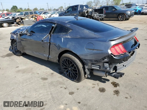 2021 Ford Mustang GT z VIN 1FA6P8CF9M5103856, wystawiony jako Copart lot #56322045 z przebiegiem 27 499 mil mil oraz Szkody całkowita. Historia ofert i sprzedaży dostępna na DreamBid. Obrazek 2.