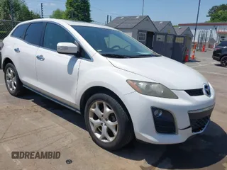2010 Mazda CX-7 Touring with VIN JM3ER2W31A0351940, listed as a IAAI auction lot 42082089 with 202,298 mi miles. Bid and sale history available at carsss.com. Image 1.
