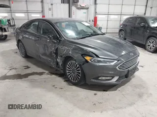 2018 Ford Fusion Titanium with VIN 3FA6P0RU1JR117010, listed as a IAAI auction lot 41603439 with 124,151 mi miles and . Bid and sale history available at DreamBid. Image 1.