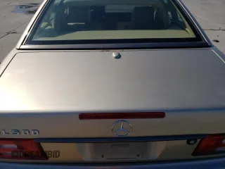 2000 Mercedes-Benz SL-Class with VIN WDBFA68F0YF188299, listed as a Copart auction lot 79522494 with 125,295 mi miles and Salvage Title. Bid and sale history available at carsss.com. Image 10.