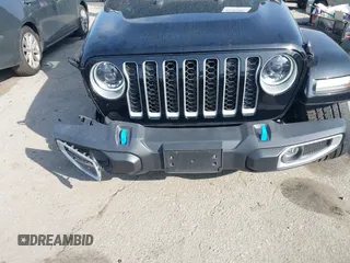2023 Jeep Wrangler Sahara with VIN 1C4JJXP67PW556933, listed as a IAAI auction lot 41587035 with 20,463 mi miles and . Bid and sale history available at DreamBid. Image 6.