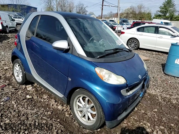 2008 Smart fortwo Pure z VIN WMEEJ31X08K095175, wystawiony jako Copart lot #52931165 z przebiegiem 102 299 mil mil oraz Szkody całkowita. Historia ofert i sprzedaży dostępna na DreamBid. Obrazek 10.