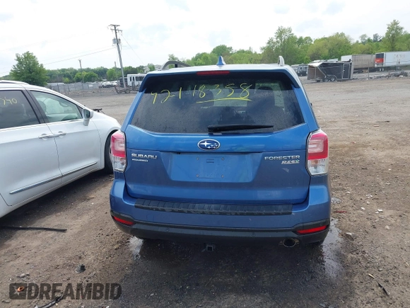 2017 Subaru Forester Touring with VIN JF2SJAWC7HH455648, listed as a IAAI auction lot 42118358 with 58,123 mi miles and . Bid and sale history available at DreamBid. Image 17.
