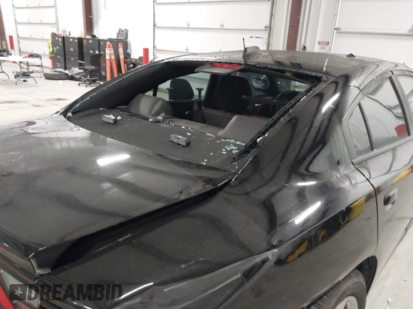 2022 Dodge Charger Police with VIN 2C3CDXAT6NH110044, listed as a IAAI auction lot 41292387 with 59,324 mi miles and . Bid and sale history available at DreamBid. Image 21.