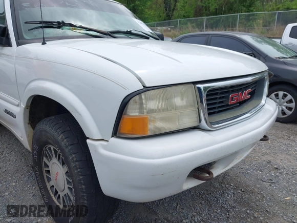 1999 GMC Jimmy SLE with VIN 1GKDT13WXX2521082, listed as a IAAI auction lot 42079903 with 160,055 mi miles. Bid and sale history available at carsss.com. Image 15.