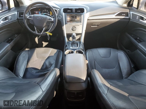 2013 Ford Fusion Titanium Hybrid with VIN 3FA6P0RU5DR321121, listed as a Copart auction lot 77019974 with 160,361 mi miles and Salvage Title. Bid and sale history available at DreamBid. Image 8.