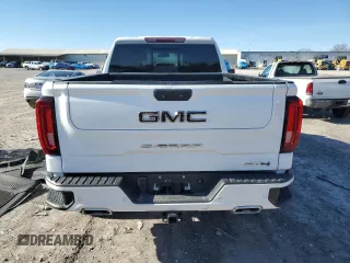 2023 GMC Sierra 1500 AT4 with VIN 3GTUUEE81PG231674, listed as a Copart auction lot 44615465 with 35,569 mi miles and Salvage title. Bid and sale history available at DreamBid. Image 6.