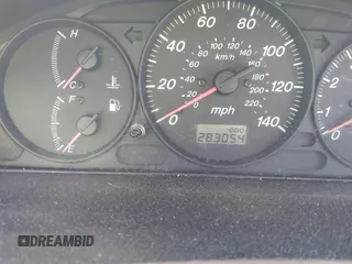 2000 Mazda Protege DX with VIN JM1BJ2229Y0235881, listed as a IAAI auction lot 41484779 with 283,054 mi miles and . Bid and sale history available at DreamBid. Image 7.