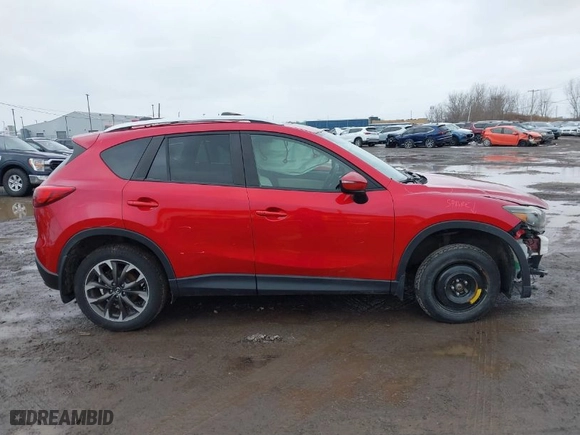 2016 Mazda CX-5 Grand Touring with VIN JM3KE4DYXG0668830, listed as a IAAI auction lot 41738187 with NaN miles. Bid and sale history available at carsss.com. Image 13.