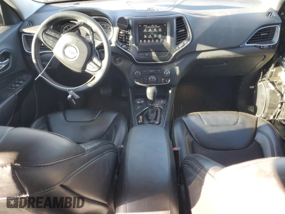 2019 Jeep Cherokee Altitude with VIN 1C4PJMLN1KD345771, listed as a Copart auction lot 48953285 with 119,719 mi miles and Salvage Title. Bid and sale history available at carsss.com. Image 8.