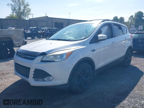 2013 Ford Escape SE with VIN 1FMCU9GXXDUB66562, listed as a IAAI auction lot 40287024 with 120,398 mi miles. Bid and sale history available at carsss.com. Image 2.