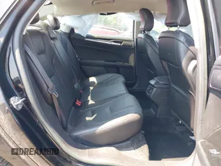 2016 Ford Fusion Titanium z VIN 3FA6P0K97GR174228, wystawiony jako IAAI lot #42636326 z przebiegiem 110 288 mil mil oraz . Historia ofert i sprzedaży dostępna na DreamBid. Obrazek 8.