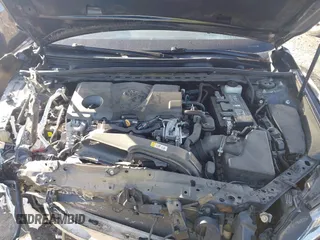 2018 Toyota Camry LE z VIN 4T1B11HK4JU151656, wystawiony jako IAAI lot #41524694 z przebiegiem 52 581 mil mil oraz . Historia ofert i sprzedaży dostępna na DreamBid. Obrazek 10.