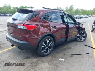 2021 Ford Escape SE Hybrid with VIN 1FMCU9BZ9MUA15592, listed as a IAAI auction lot 42261312 with 56,525 mi miles and . Bid and sale history available at DreamBid. Image 4.