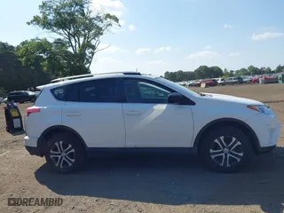 2017 Toyota RAV4 LE with VIN JTMBFREVXHD209590, listed as a IAAI auction lot 40332211 with 50,426 mi miles. Bid and sale history available at carsss.com. Image 13.