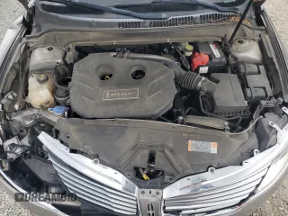 2015 Lincoln MKZ z VIN 3LN6L2G9XFR611837, wystawiony jako Copart lot #55038635 z przebiegiem 133 596 mil mil oraz Szkoda całkowita • Salvage title. Historia ofert i sprzedaży dostępna na DreamBid. Obrazek 11.