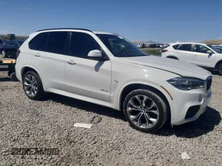2014 BMW X5 xDrive35d with VIN 5UXKS4C58E0J97054, listed as a Copart auction lot 54004065 with 157,151 mi miles and Clean Title. Bid and sale history available at carsss.com. Image 4.