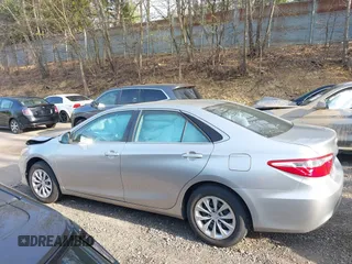 2016 Toyota Camry XLE with VIN 4T4BF1FK5GR582980, listed as a IAAI auction lot 42145802 with 85,702 mi miles and . Bid and sale history available at DreamBid. Image 15.