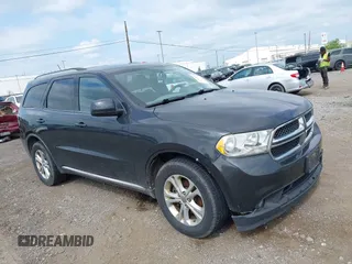 2011 Dodge Durango Express z VIN 1D4RE2GG0BC624263, wystawiony jako IAAI lot #42766683 z przebiegiem 143 826 mil mil oraz . Historia ofert i sprzedaży dostępna na DreamBid. Obrazek 1.