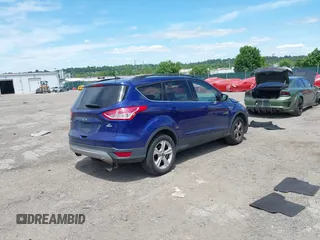 2016 Ford Escape SE z VIN 1FMCU9GX0GUA76647, wystawiony jako IAAI lot #42314233 z przebiegiem 86 010 mil mil oraz . Historia ofert i sprzedaży dostępna na DreamBid. Obrazek 4.
