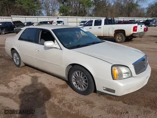 2003 Cadillac DeVille DHS with VIN 1G6KE54YX3U189473, listed as a IAAI auction lot 41734202 with 127,813 mi miles. Bid and sale history available at carsss.com. Image 1.