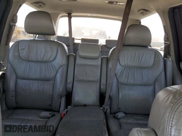 2007 Honda Odyssey EX-L z VIN 5FNRL38677B424117, wystawiony jako Copart lot #58814235 z przebiegiem 188 908 mil mil oraz Szkoda całkowita • Salvage title. Historia ofert i sprzedaży dostępna na DreamBid. Obrazek 10.
