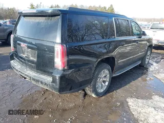 2015 GMC Yukon XL SLT with VIN 1GKS2HKC9FR159164, listed as a IAAI auction lot 41708822 with 136,730 mi miles. Bid and sale history available at carsss.com. Image 4.