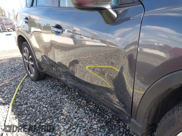2016 Mazda CX-5 Grand Touring with VIN JM3KE4DY9G0895006, listed as a IAAI auction lot 41703146 with 39,359 mi miles. Bid and sale history available at carsss.com. Image 6.