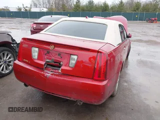 2011 Cadillac STS RWD with VIN 1G6DW6ED4B0128004, listed as a IAAI auction lot 41664631 with 546,850 mi miles and . Bid and sale history available at carsss.com. Image 4.