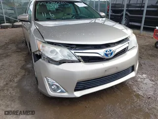 2014 Toyota Camry Hybrid LE with VIN 4T1BD1FK4EU106488, listed as a IAAI auction lot 40794286 with 98,911 mi miles. Bid and sale history available at carsss.com. Image 6.