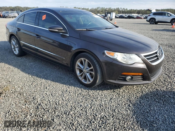2010 Volkswagen CC Luxury with VIN WVWHL7AN5AE528229, listed as a Copart auction lot 74312554 with Not provided miles and Salvage title. Bid and sale history available at DreamBid. Image 4.