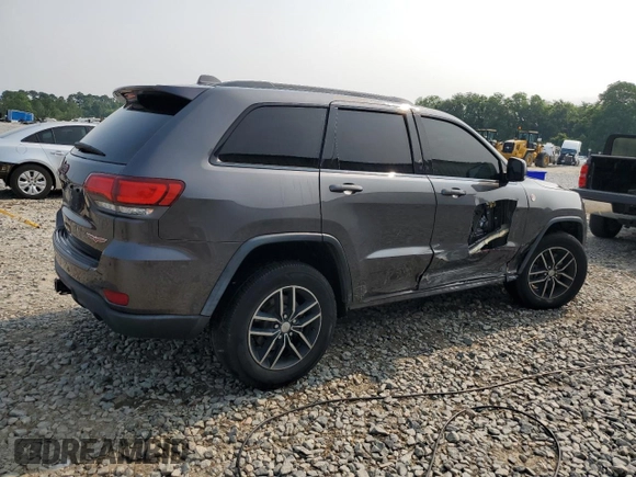 2017 Jeep Grand Cherokee Trailhawk with VIN 1C4RJFLT3HC614449, listed as a Copart auction lot 58559335 with 153,051 mi miles and Salvage title. Bid and sale history available at DreamBid. Image 3.