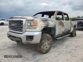 2018 GMC Sierra 2500HD z VIN 1GT12REG3JF222944, wystawiony jako Copart lot #67135784 z przebiegiem Nie podano mil oraz Nie do naprawy • Non repairable. Historia ofert i sprzedaży dostępna na DreamBid. Obrazek 1.