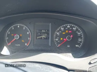 2014 Volkswagen Jetta S z VIN 3VW2K7AJ3EM221290, wystawiony jako IAAI lot #42310867 z przebiegiem 118 062 mil mil oraz . Historia ofert i sprzedaży dostępna na DreamBid. Obrazek 7.