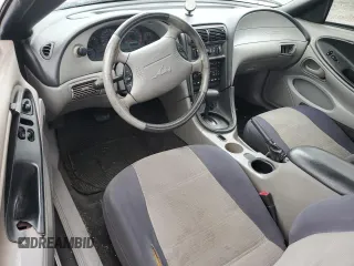 2003 Ford Mustang Standard z VIN 1FAFP40483F404784, wystawiony jako Copart lot #55979115 z przebiegiem Nie podano mil oraz Szkoda całkowita • Salvage title. Historia ofert i sprzedaży dostępna na DreamBid. Obrazek 8.