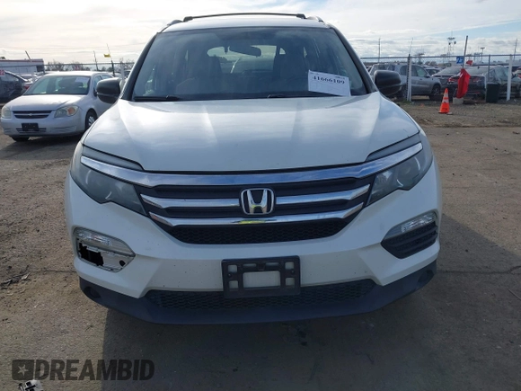 2016 Honda Pilot LX with VIN 5FNYF6H1XGB009768, listed as a IAAI auction lot 41666109 with 137,733 mi miles. Bid and sale history available at carsss.com. Image 12.