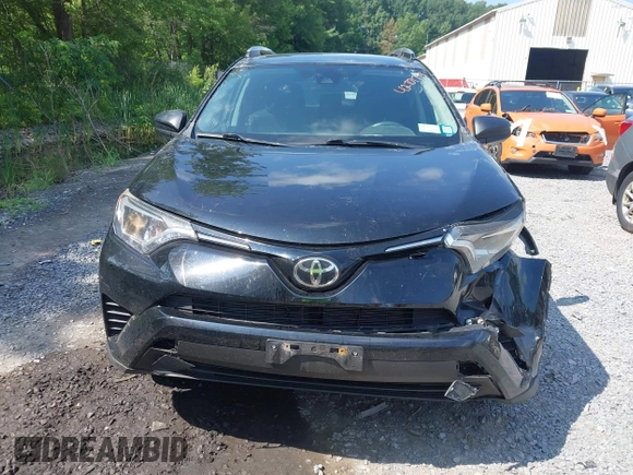 2017 Toyota RAV4 LE with VIN 2T3BFREV5HW651308, listed as a IAAI auction lot 42701783 with 112,829 mi miles and . Bid and sale history available at DreamBid. Image 12.