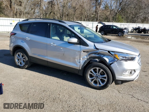 2018 Ford Escape SE with VIN 1FMCU0G90JUC13607, listed as a Copart auction lot 46534215 with 131,633 mi miles and Salvage Title. Bid and sale history available at carsss.com. Image 4.