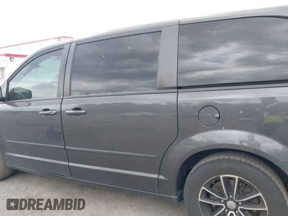 2015 Dodge Grand Caravan American Value with VIN 2C4RDGBG2FR542844, listed as a IAAI auction lot 42109983 with 129,718 mi miles and . Bid and sale history available at DreamBid. Image 14.