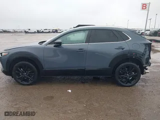 2022 Mazda CX-30 2.5 S Preferred Package with VIN 3MVDMBCL4NM422122, listed as a IAAI auction lot 41598588 with 52,837 mi miles. Bid and sale history available at carsss.com. Image 14.